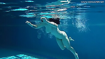 Young Russian Girl Dives Into Pool Water