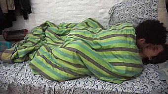 Two Young Friends Get Intimate Under The Blanket, Leading To Passionate And Heated Sex