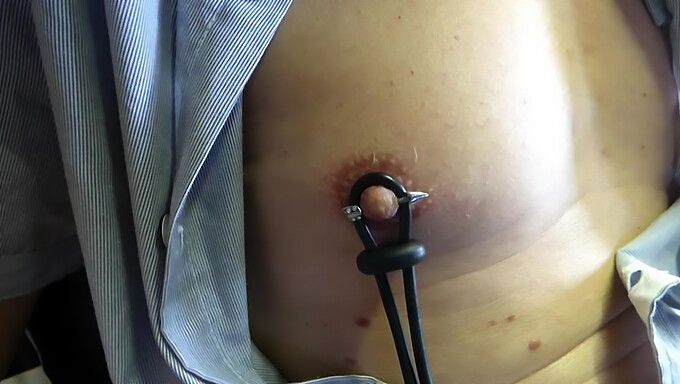 Close-Up Of Big Nipples And Cock Precum In Electrostim Bdsm Video